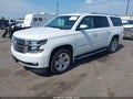 2017 Chevrolet Suburban — photo 2 of 16 | VIN 1GNSKJKC7HR173318