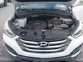2016 Hyundai Santa Fe — photo 10 of 11 | VIN 5XYZT3LB8GG350297
