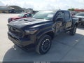 2025 Toyota Tacoma — photo 2 of 16 | VIN 3TMKB5FNXSM035633