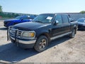 2001 Ford F-150 — photo 2 of 13 | VIN 1FTRW07L01KE53529