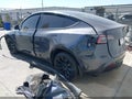 2023 Tesla Model Y — photo 3 of 23 | VIN 7SAYGDEE3PA024461