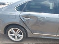 2014 Volkswagen Passat — photo 6 of 12 | VIN 1VWBN7A31EC044152
