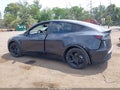 2026 Tesla Model Y — photo 15 of 19 | VIN 7SAYGDEE1TF614624