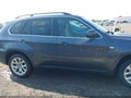 2013 BMW X5 — photo 13 of 16 | VIN 5UXZV4C56DL992431