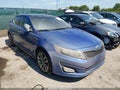 2015 Kia Optima — photo 1 of 16 | VIN 5XXGR4A60FG362254