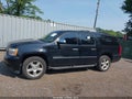 2011 Chevrolet Suburban — photo 14 of 16 | VIN 1GNSKKE33BR239968