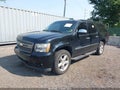 2011 Chevrolet Suburban — photo 2 of 16 | VIN 1GNSKKE33BR239968