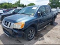 2014 Nissan Titan — photo 2 of 18 | VIN 1N6BA0EC9EN510119