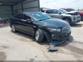 2014 Ford Taurus — photo 1 of 16 | VIN 1FAHP2E89EG141114