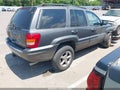 2002 Jeep Grand Cherokee — photo 4 of 14 | VIN 1J8GX58J72C163050