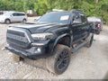 2016 Toyota Tacoma — photo 2 of 16 | VIN 3TMCZ5AN3GM003279