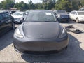 2023 Tesla Model Y — photo 11 of 15 | VIN 7SAYGDEE9PA173568