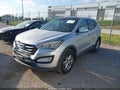 2013 Hyundai Santa Fe — photo 2 of 12 | VIN 5XYZWDLA5DG015773