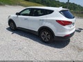 2016 Hyundai Santa Fe — photo 3 of 16 | VIN 5XYZTDLBXGG329909