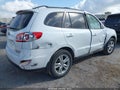 2012 Hyundai Santa Fe — photo 4 of 11 | VIN 5XYZK3AB9CG149850