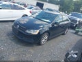 2013 Volkswagen Jetta — photo 2 of 11 | VIN 3VWDP7AJXDM353391