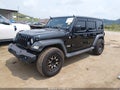 2018 Jeep Wrangler Unlimited — photo 2 of 16 | VIN 1C4HJXDG2JW111339