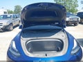 2024 Tesla Model Y — photo 10 of 17 | VIN 7SAYGDEE7RA238971