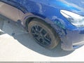 2023 Tesla Model Y — photo 23 of 23 | VIN 7SAYGAEE4PF851225