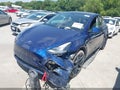 2023 Tesla Model Y — photo 2 of 23 | VIN 7SAYGAEE4PF851225
