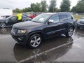2015 Jeep Grand Cherokee — photo 2 of 15 | VIN 1C4RJFBG6FC665736