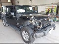 2017 Jeep Wrangler Unlimited — photo 6 of 17 | VIN 1C4BJWDG5HL606582