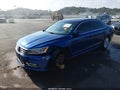 2016 Volkswagen Passat — photo 2 of 17 | VIN 1VWBS7A39GC043388