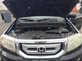 2011 Honda Pilot — photo 10 of 18 | VIN 5FNYF4H6XBB010959