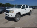 2006 Toyota Tacoma — photo 2 of 17 | VIN 5TELU42N26Z207869