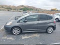 2011 Honda Fit — photo 14 of 16 | VIN JHMGE8H56BC014340