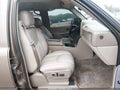2004 Chevrolet Suburban 1500 — photo 5 of 11 | VIN 1GNFK16T84J275232