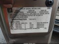 2004 Chevrolet Suburban 1500 — photo 9 of 11 | VIN 1GNFK16T84J275232