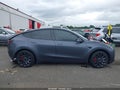 2023 Tesla Model Y — photo 13 of 18 | VIN 7SAYGDEF6PF668595