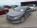 2013 Volkswagen Passat — photo 2 of 16 | VIN 1VWBH7A36DC052706
