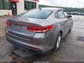 2018 Kia Optima — photo 4 of 15 | VIN 5XXGT4L36JG220360