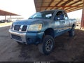 2006 Nissan Titan — photo 2 of 11 | VIN 1N6AA06AX6N543401