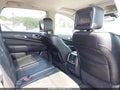 2013 Infiniti JX35 — photo 8 of 11 | VIN 5N1AL0MN7DC352218