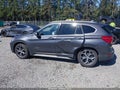 2018 BMW X1 — photo 14 of 18 | VIN WBXHT3Z39J4A66314