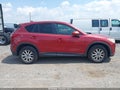 2013 Mazda CX-5 — photo 13 of 16 | VIN JM3KE2CE9D0134984