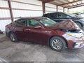 2020 Kia Optima — photo 13 of 16 | VIN 5XXGT4L39LG381689