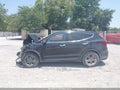 2018 Hyundai Santa Fe — photo 13 of 15 | VIN 5XYZTDLB2JG571598