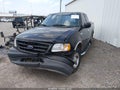 2001 Ford F-150 — photo 2 of 10 | VIN 1FTZX17271NB64429