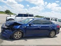2018 Kia Optima — photo 13 of 15 | VIN 5XXGT4L32JG188605