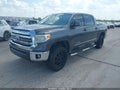 2016 Toyota Tundra — photo 2 of 16 | VIN 5TFEM5F13GX102210