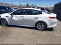 2018 Kia Optima — photo 13 of 16 | VIN 5XXGT4L36JG258588