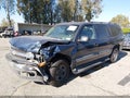 2003 Chevrolet Suburban 1500 — photo 2 of 18 | VIN 1GNEC16T63J275799
