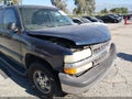 2003 Chevrolet Suburban 1500 — photo 13 of 18 | VIN 1GNEC16T63J275799