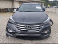 2018 Hyundai Santa Fe — photo 13 of 17 | VIN 5XYZUDLB9JG554780