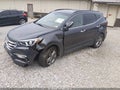 2018 Hyundai Santa Fe — photo 2 of 17 | VIN 5XYZUDLB9JG554780