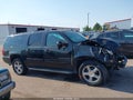 2011 Chevrolet Suburban — photo 14 of 17 | VIN 1GNSKJE34BR384401